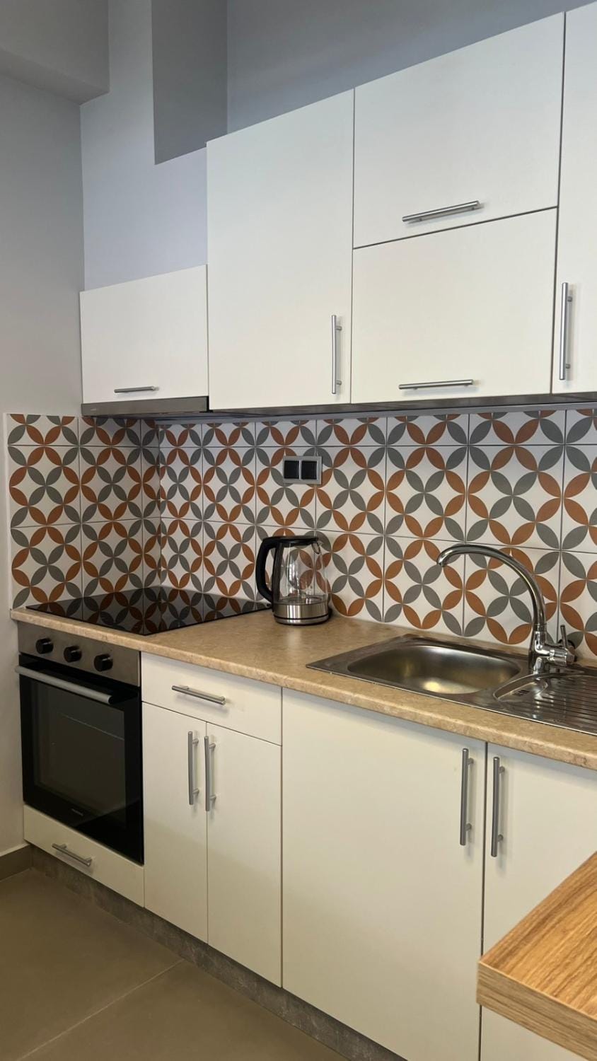 Kitchen or kitchenette, stove