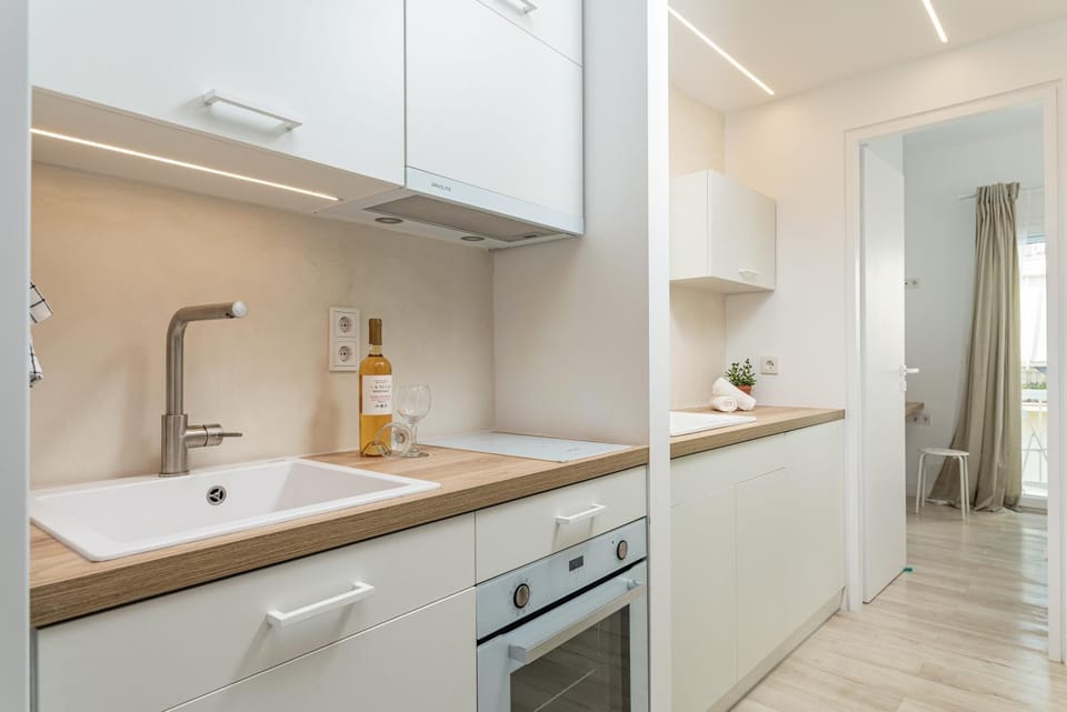 Kitchen or kitchenette, oven, stove