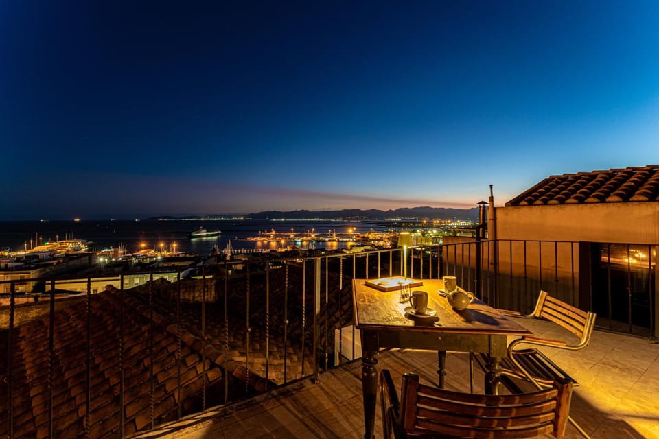 Property building, Night, Natural landscape, View (from property/room), Balcony/Terrace, City view