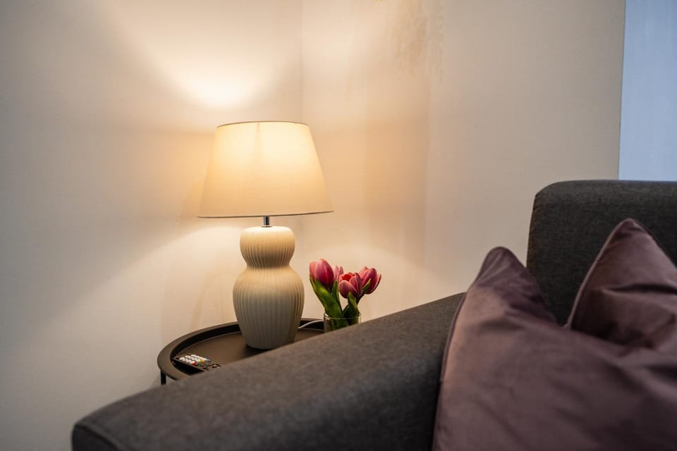 Bed, Living room, Seating area, Bedroom