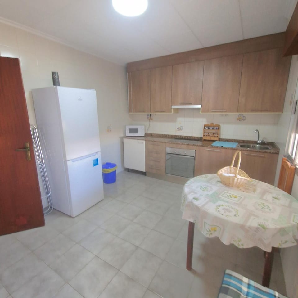 Kitchen or kitchenette, oven, stove