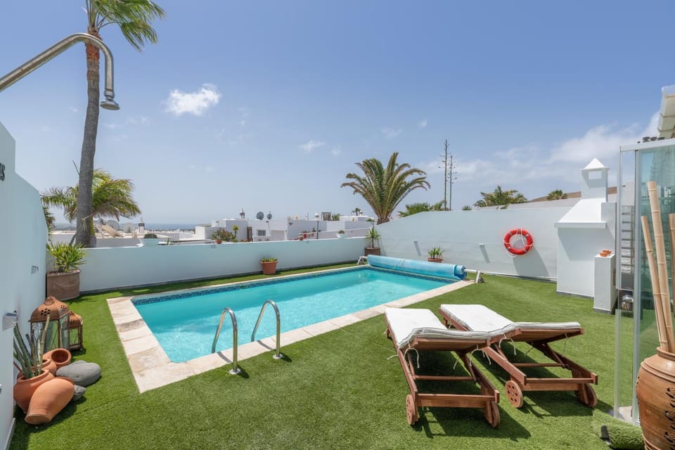 Property building, Living room, Swimming pool