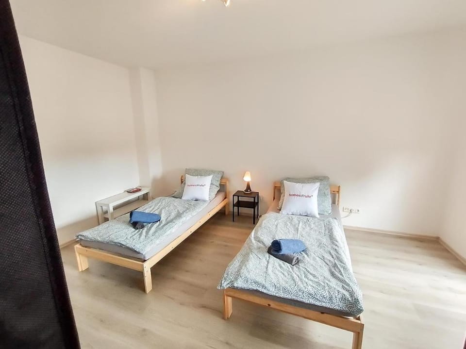 homes of ruhr - Monteurwohnung Halde Apartment in Oberhausen