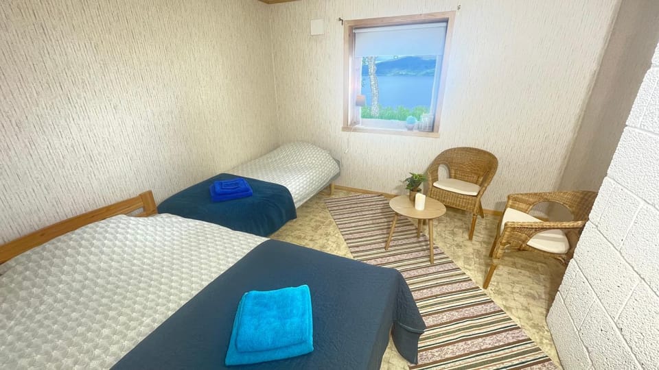 View (from property/room), Seating area, Bedroom, Mountain view, Sea view