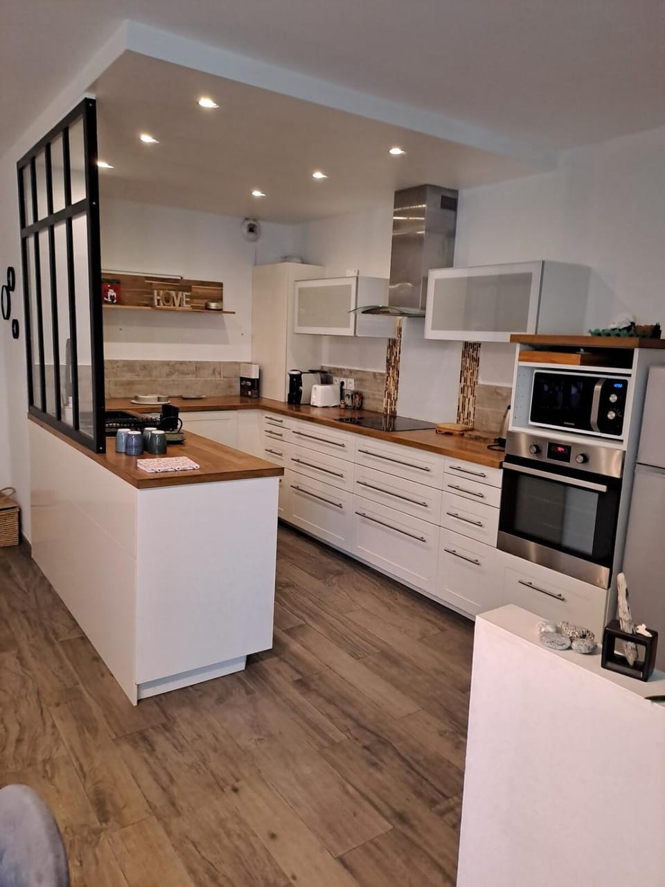 Kitchen or kitchenette, dishwasher, oven, stove, toaster