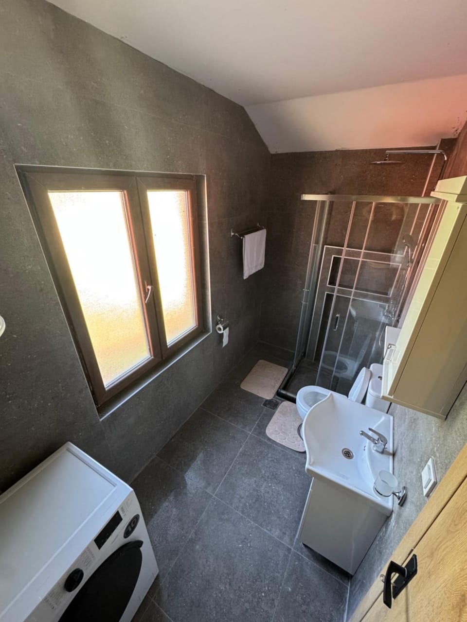 Shower, Toilet, Bathroom, hair dryier, towels