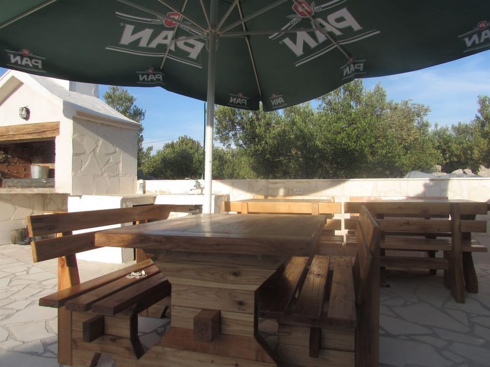 Property building, Patio, BBQ facilities, Balcony/Terrace, Dining area