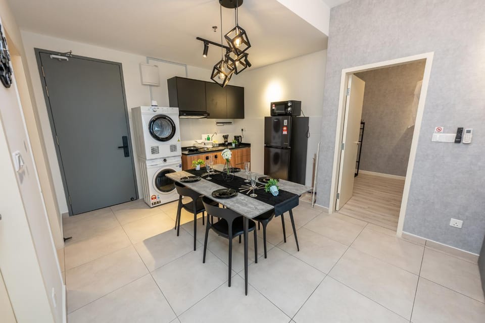 Kitchen or kitchenette, Dining area, stove, washing machine, dryer, air conditioner