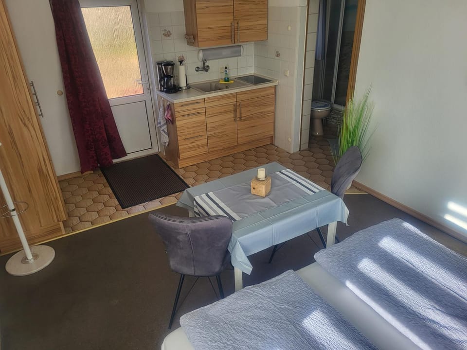 Photo of the whole room, Seating area, stove