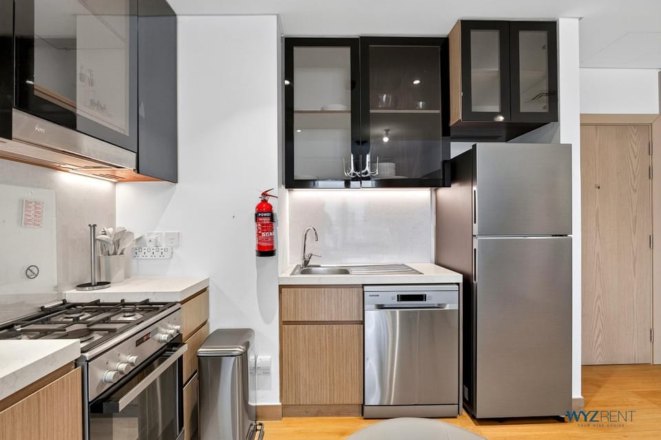 Kitchen or kitchenette, dishwasher, oven, stove, toaster