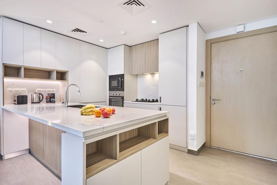 Kitchen or kitchenette, dishwasher, oven, stove