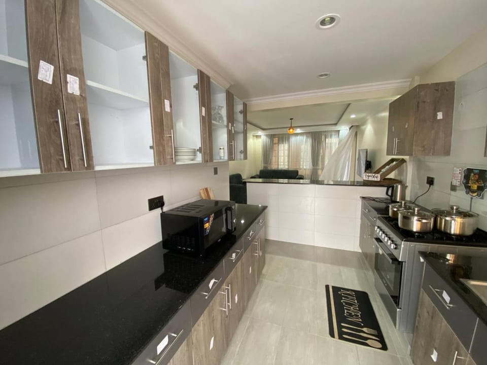 Kitchen or kitchenette, oven, stove