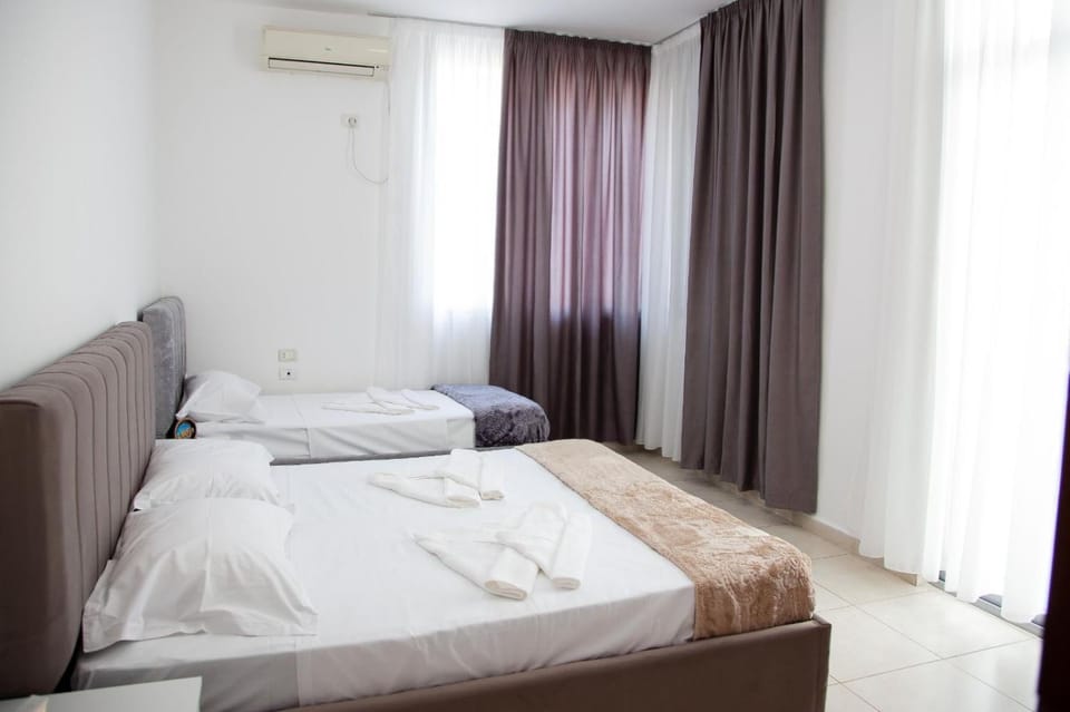 Bed, Photo of the whole room, Bedroom, towels, air conditioner
