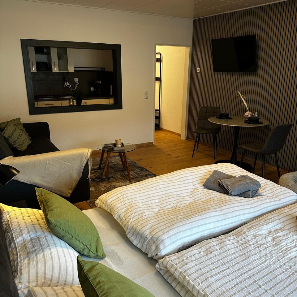 Bed, Living room, Photo of the whole room, Seating area, Bedroom