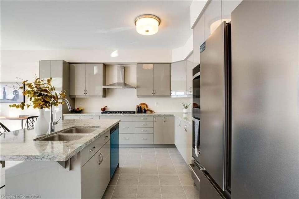 Kitchen or kitchenette, dishwasher, oven, stove