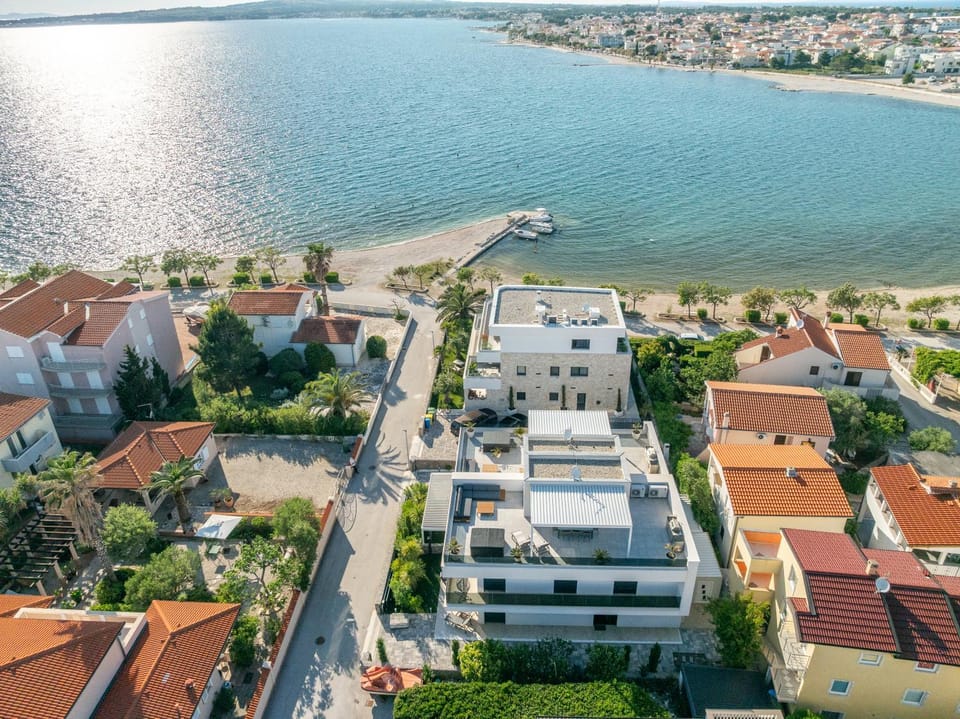 Property building, Neighbourhood, Bird's eye view, Beach, Sea view