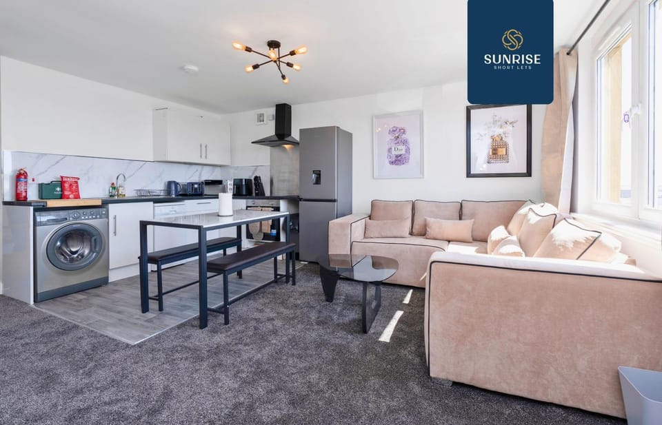 Kitchen or kitchenette, Living room, Seating area, Dining area, dishwasher, oven, stove, washing machine, dryer