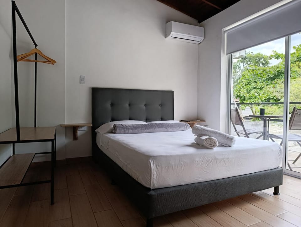 Bed, Balcony/Terrace, Photo of the whole room, Bedroom, towels, air conditioner