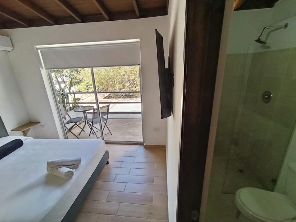 Shower, Toilet, Bed, Bathroom, Photo of the whole room, Bedroom, towels