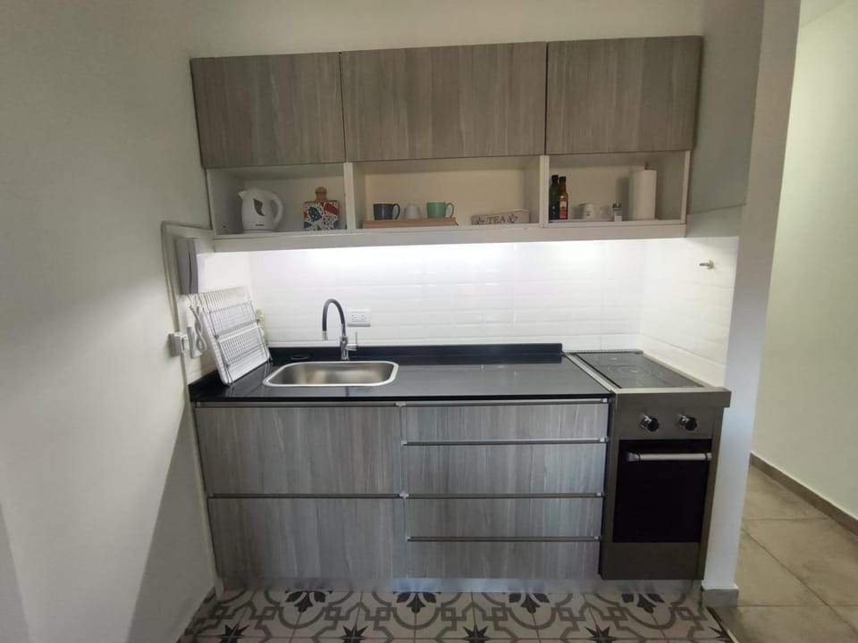 Kitchen or kitchenette, oven, stove