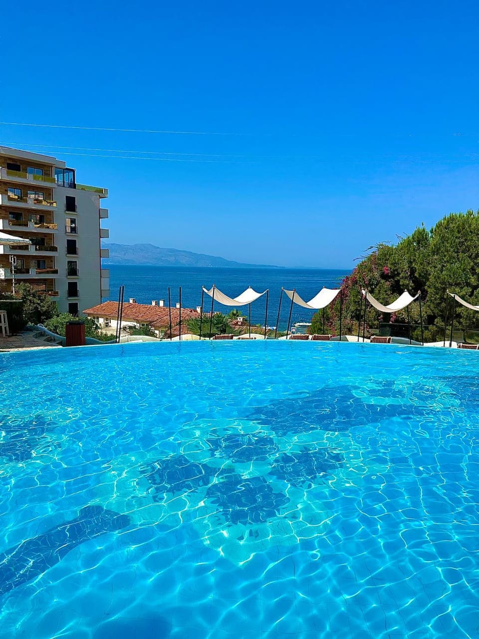 Day, Natural landscape, Pool view, Sea view, Swimming pool, sunbed