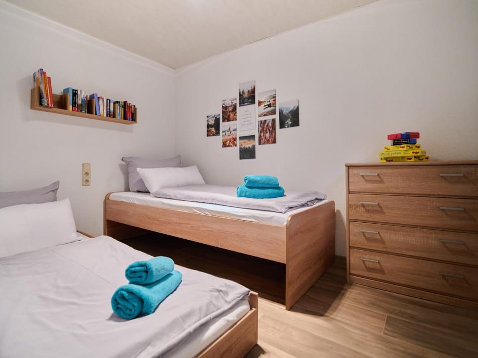 Bed, Library, Photo of the whole room, Bedroom, towels