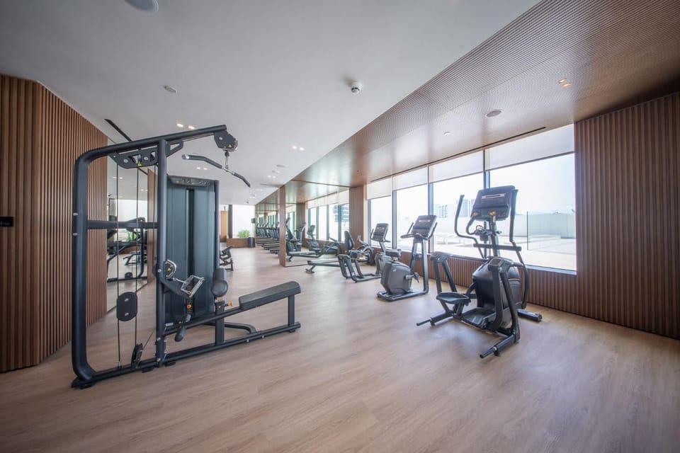 Free housekeeping visits during your stay - StayShort - Modern 1-Bedroom in JVC Sleeps 4 Apartment in Dubai