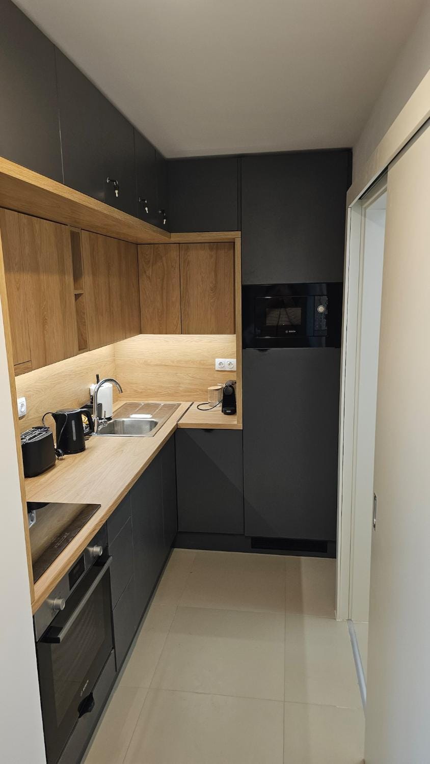 Kitchen or kitchenette, oven, stove