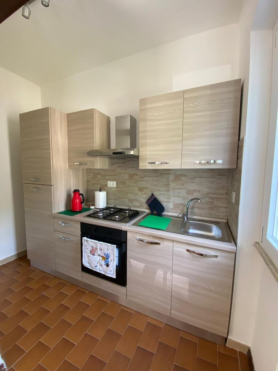 Kitchen or kitchenette, stove, toaster