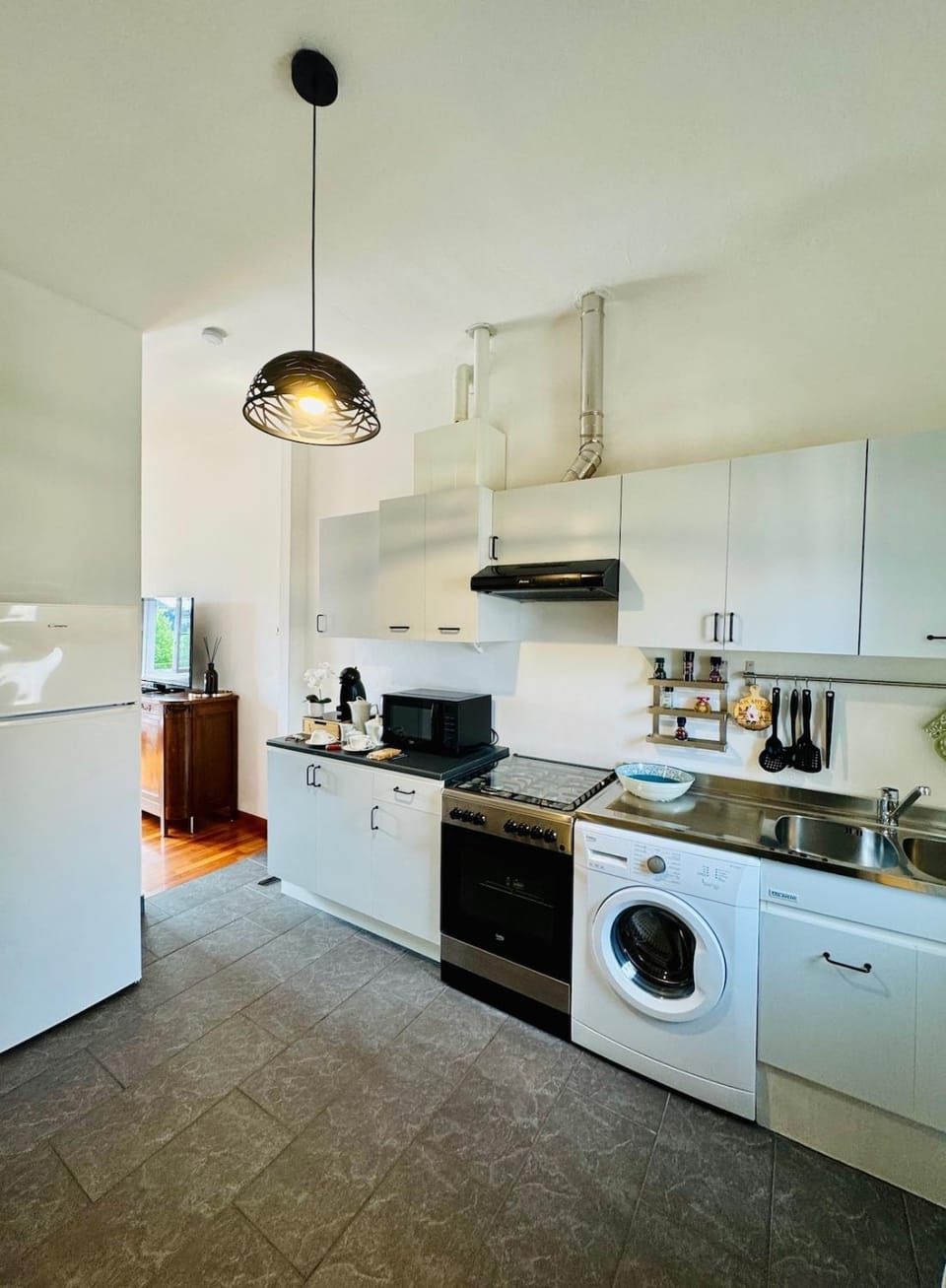 Kitchen or kitchenette, dishwasher, stove, toaster