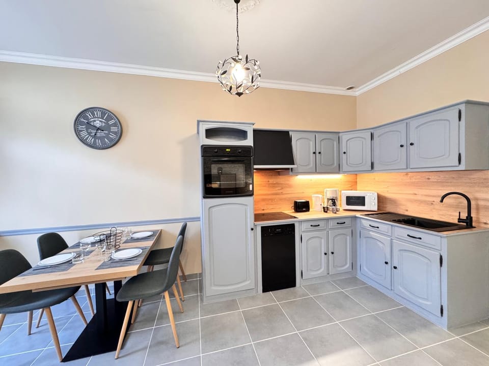 Dining area, dishwasher, oven, stove, kitchen