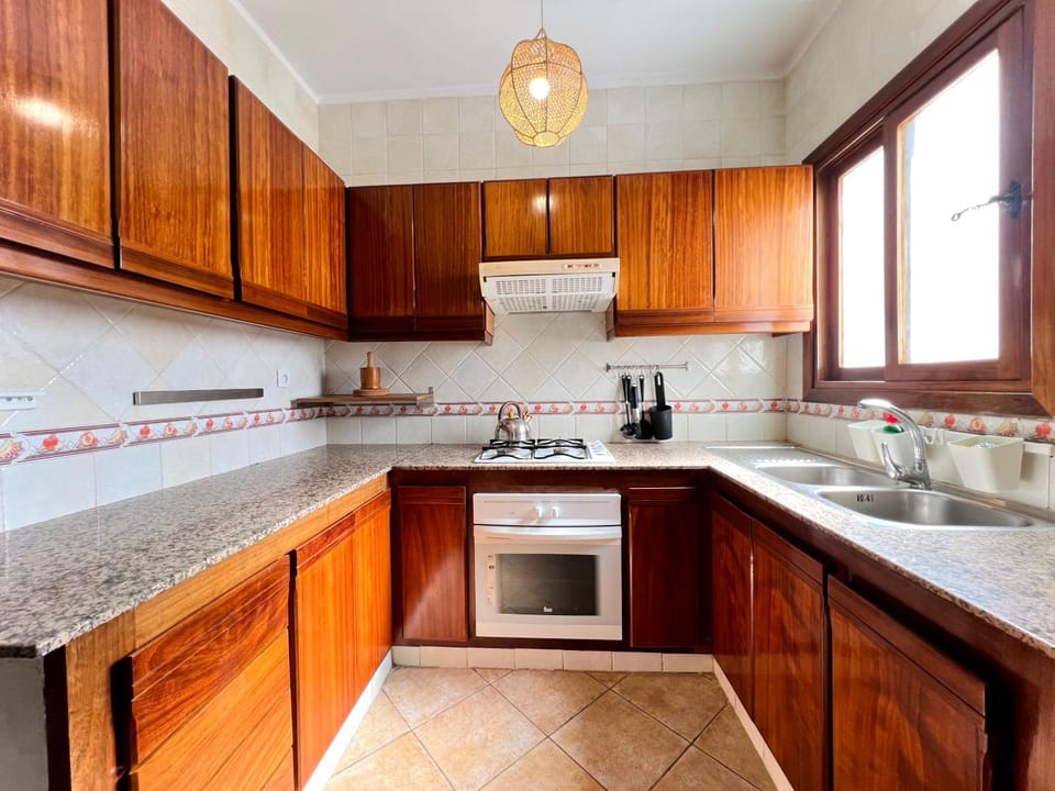 Kitchen or kitchenette, oven