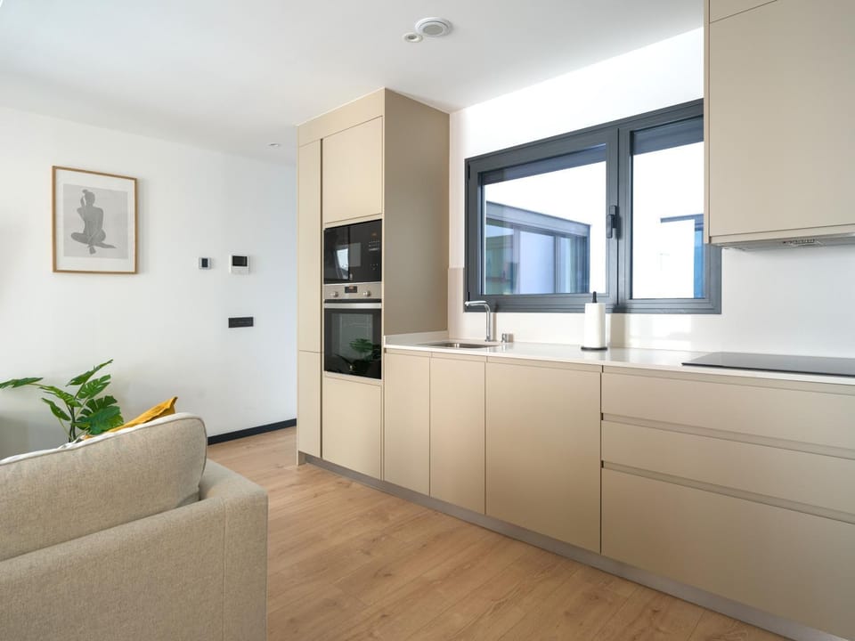Kitchen or kitchenette, Living room, dishwasher, microwave, oven, stove