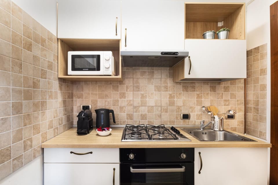 Kitchen or kitchenette, stove