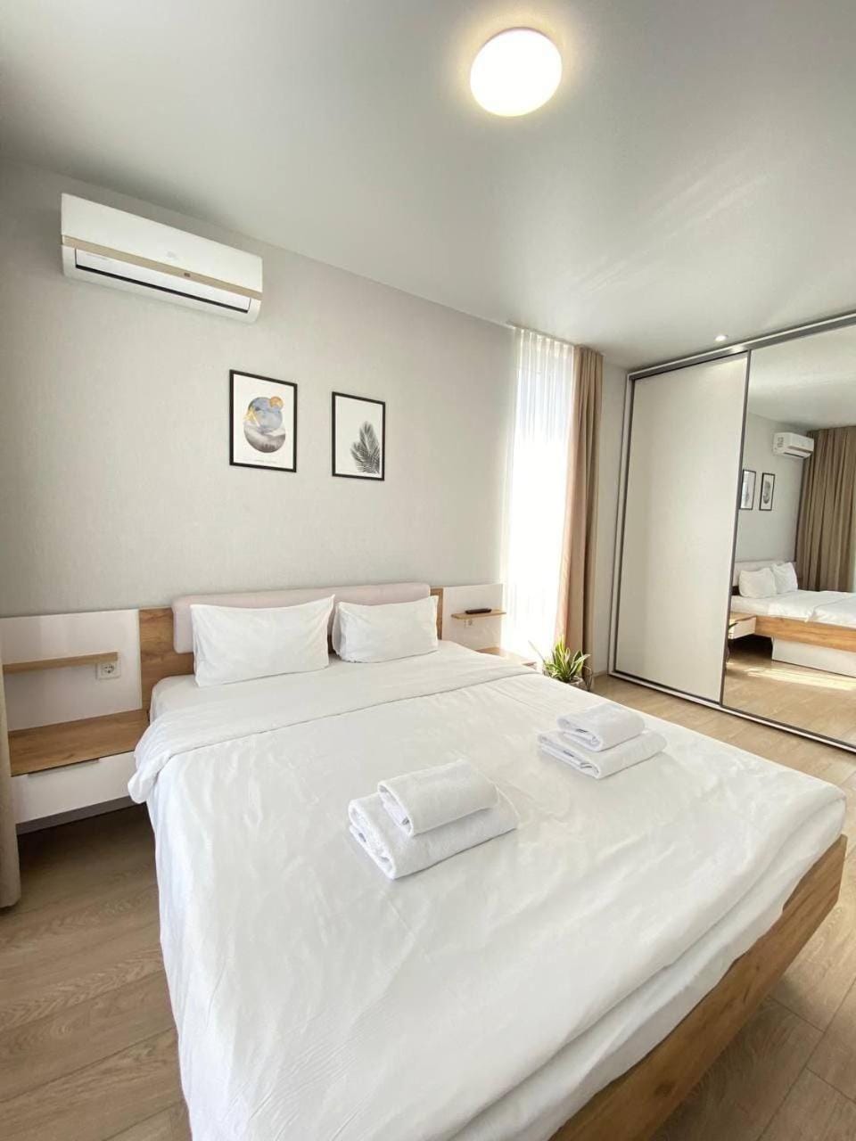 Bed, Photo of the whole room, Bedroom, towels, air conditioner
