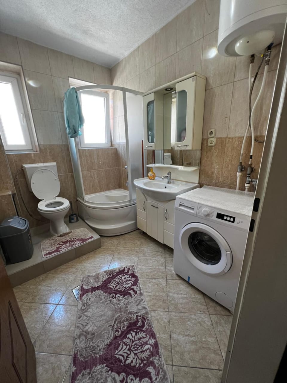 bidet, towels, washing machine