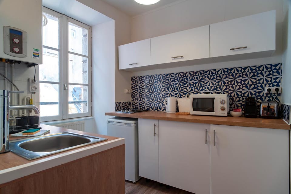Kitchen or kitchenette, stove