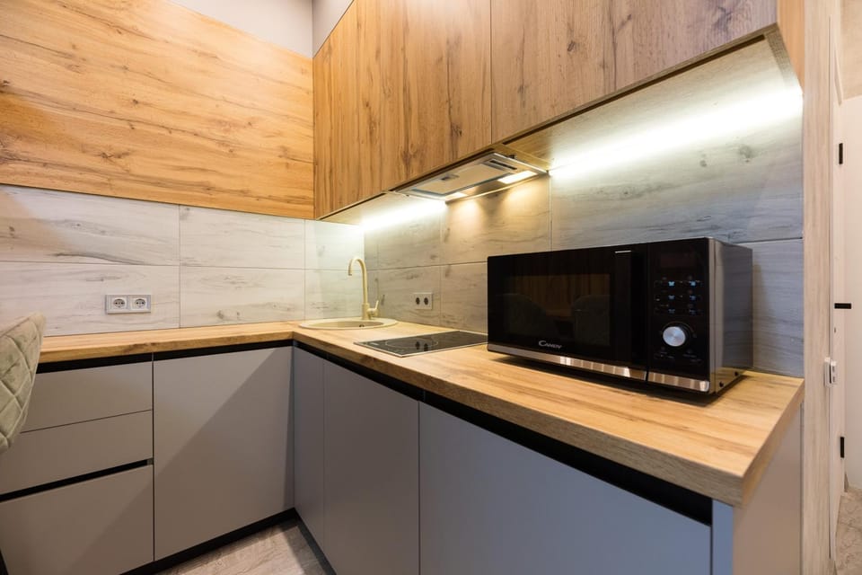 Kitchen or kitchenette, stove