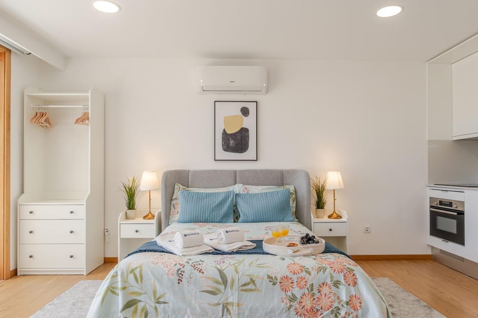 Bed, Bedroom, oven, towels, air conditioner