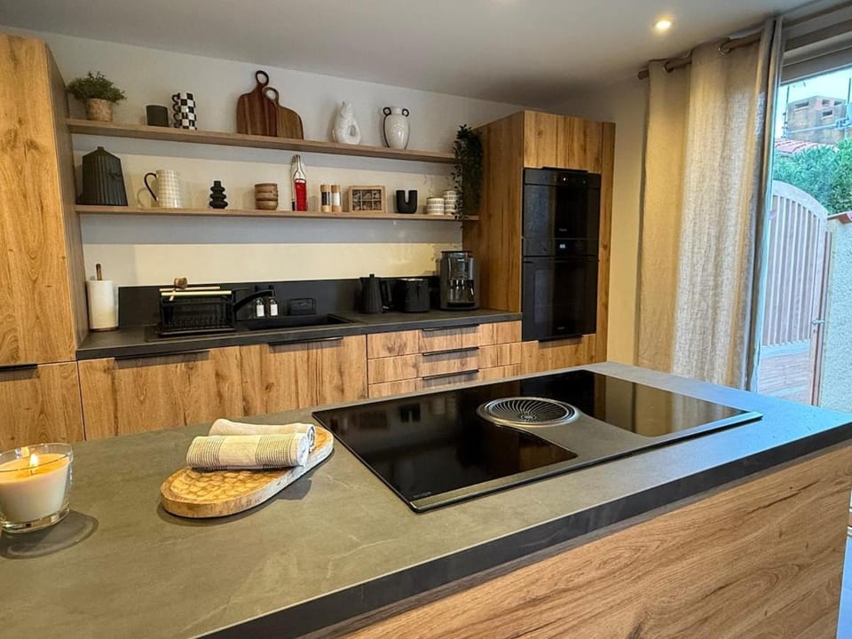 Kitchen or kitchenette, stove, toaster
