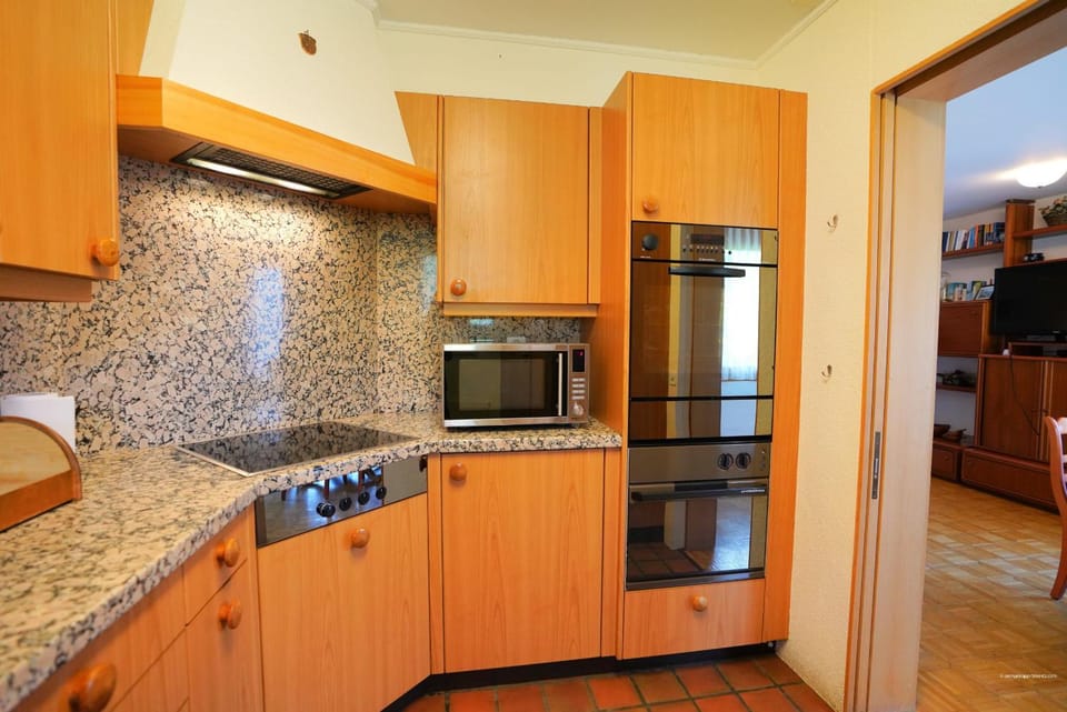 Kitchen or kitchenette, oven, stove
