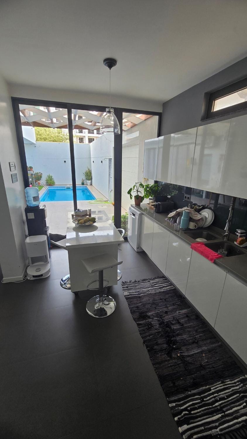 Kitchen or kitchenette, Pool view