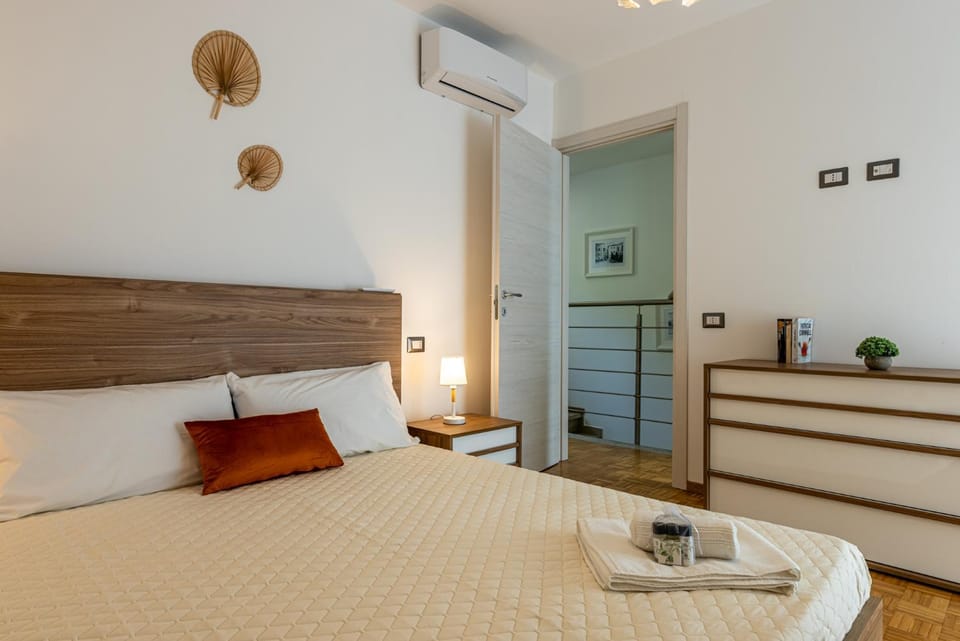 Photo of the whole room, Bedroom, towels, air conditioner