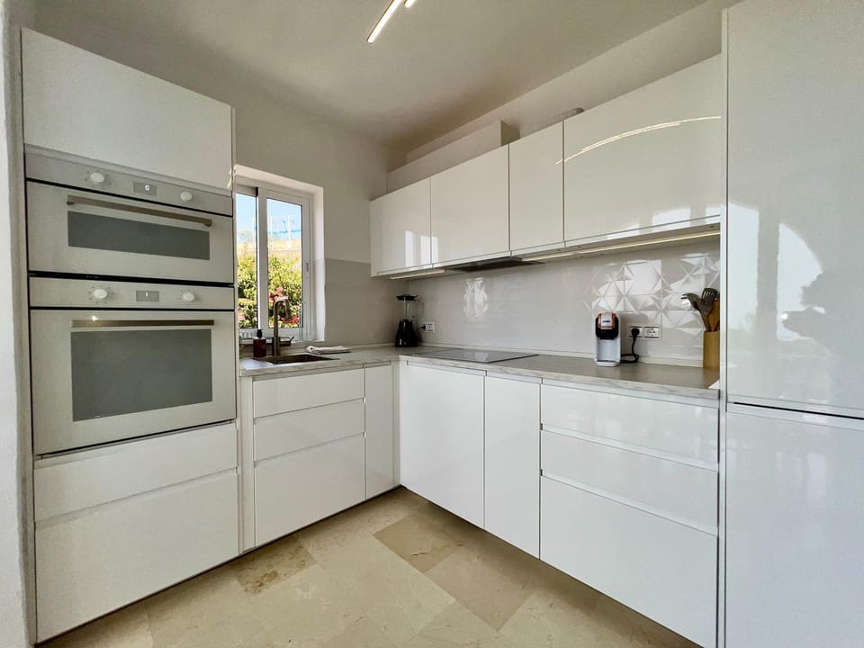 Kitchen or kitchenette, oven, stove