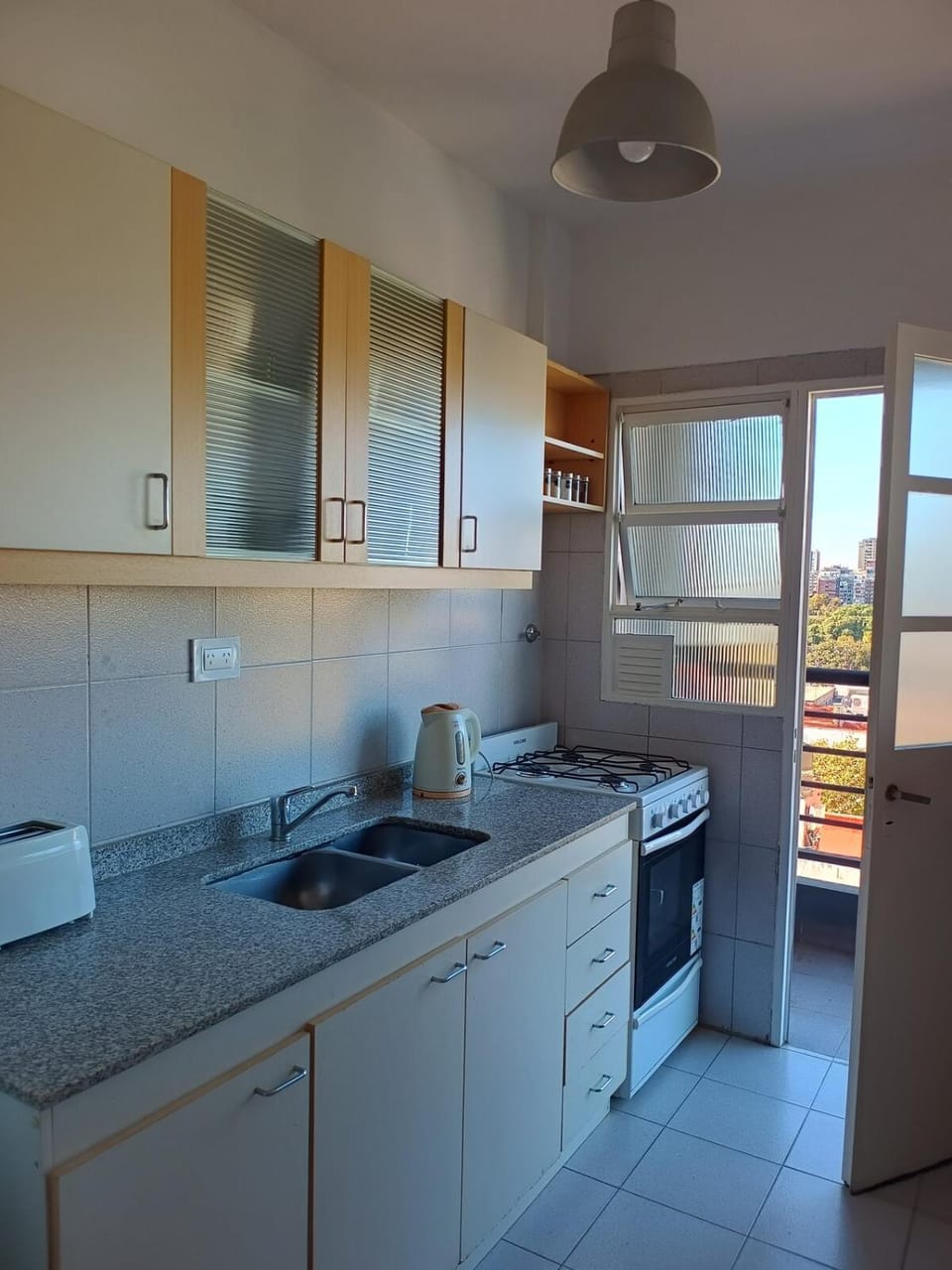 Kitchen or kitchenette, oven