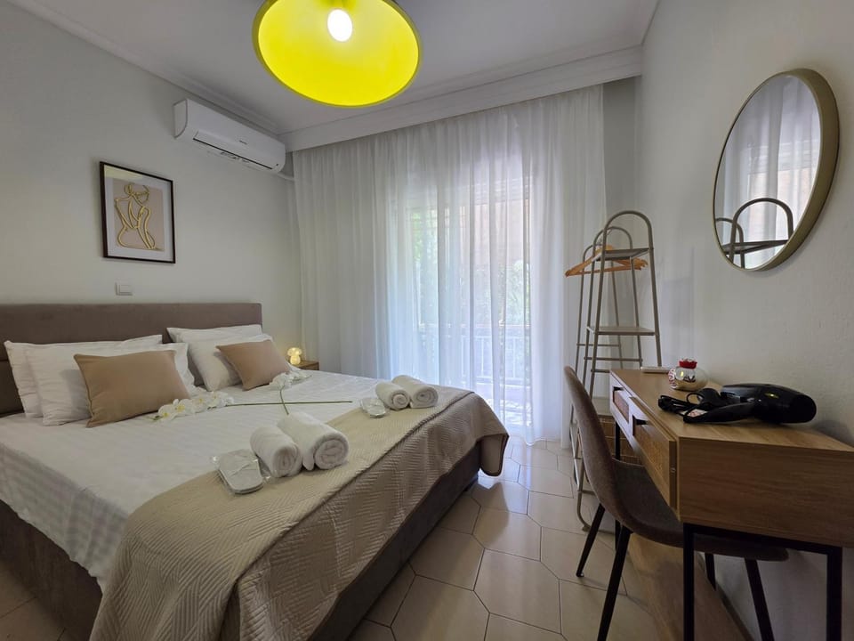 Bed, Photo of the whole room, Bedroom, towels, air conditioner