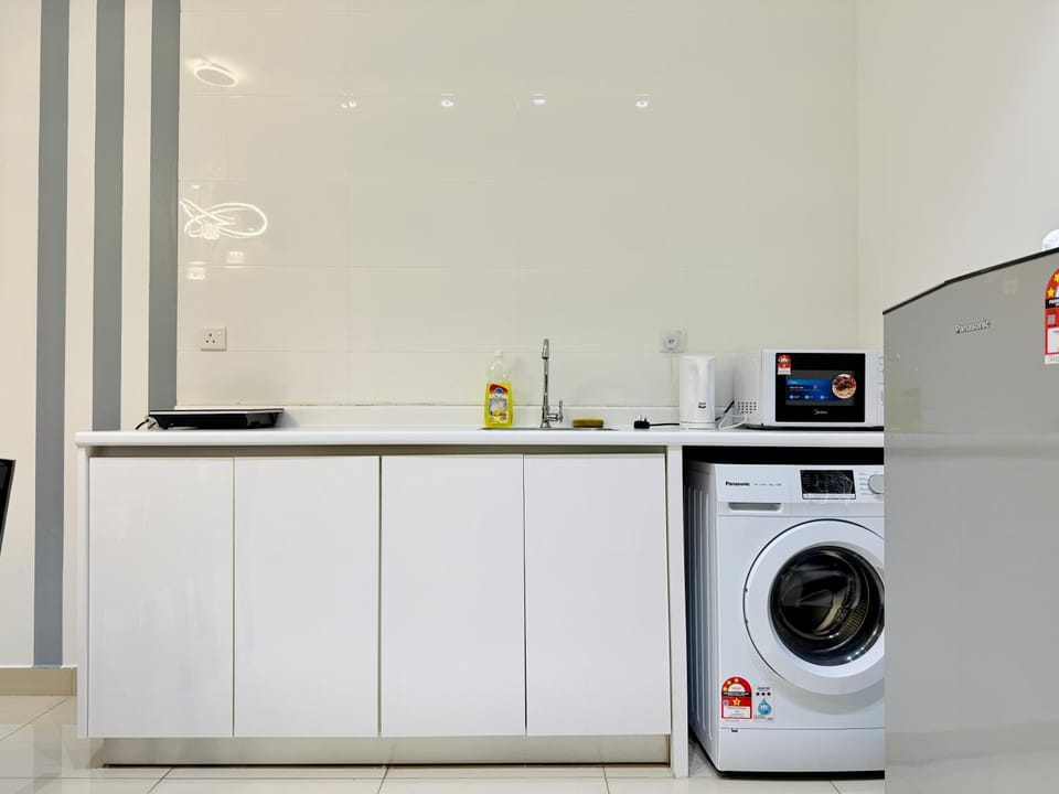 Kitchen or kitchenette, washing machine