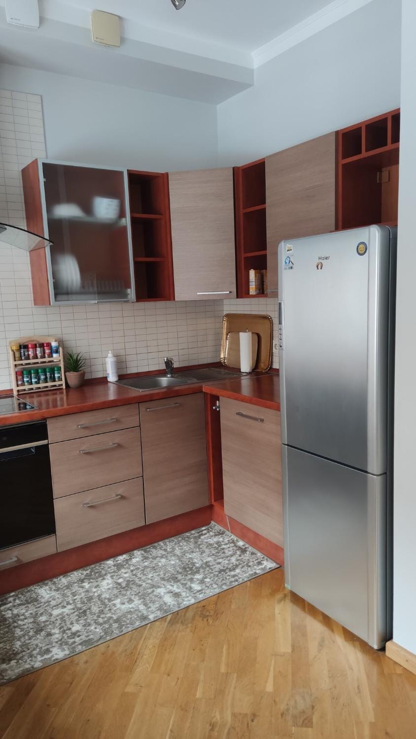 Kitchen or kitchenette, dishwasher, oven, stove