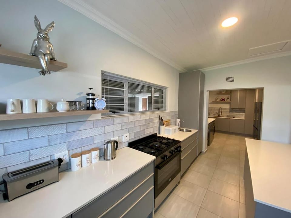 Kitchen or kitchenette, oven, stove