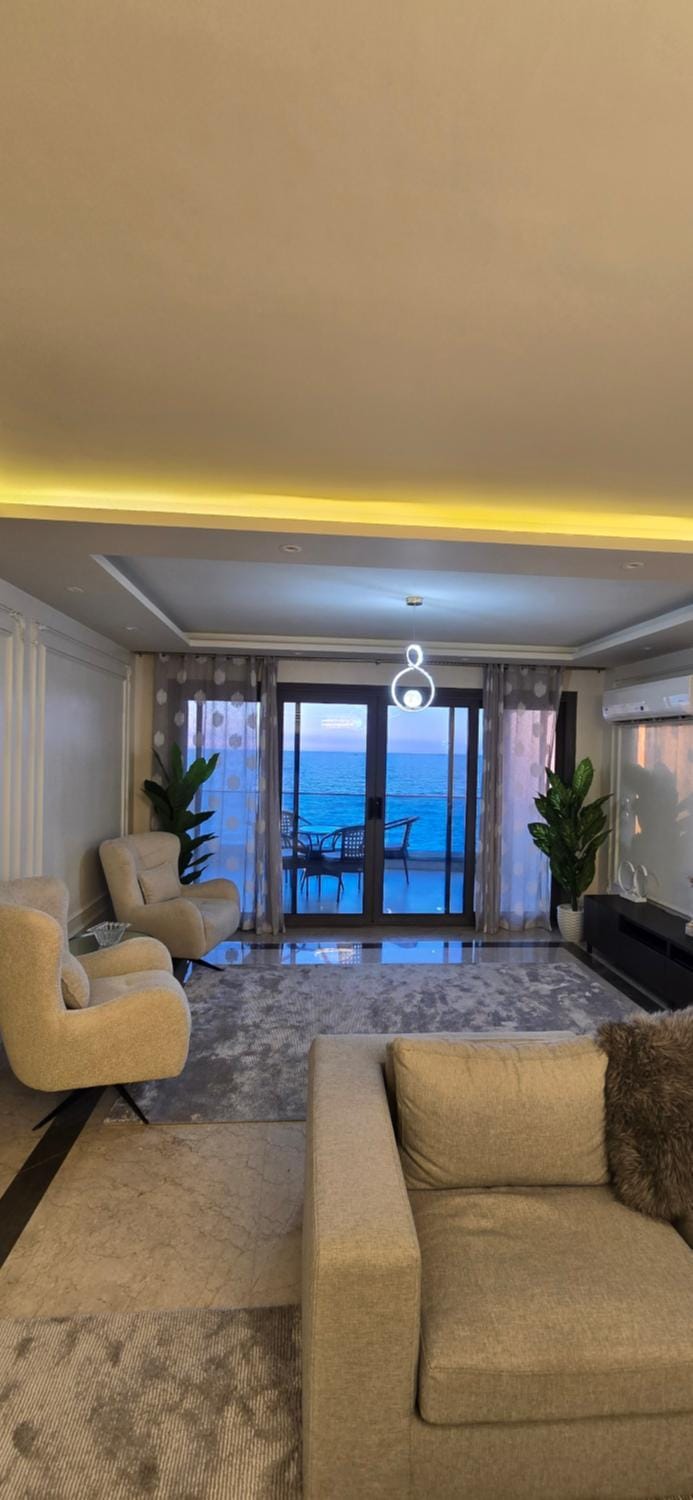 Natural landscape, Living room, Seating area, Sea view